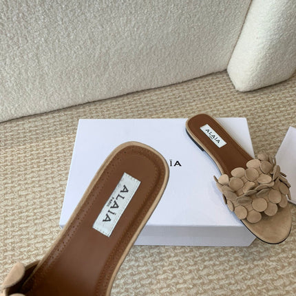 ALAIA FLAT MULE IN BEIGE CREAM SUEDE