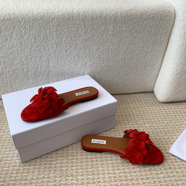ALAIA FLAT MULE IN CHERRY RED SUEDE