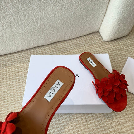 ALAIA FLAT MULE IN CHERRY RED SUEDE