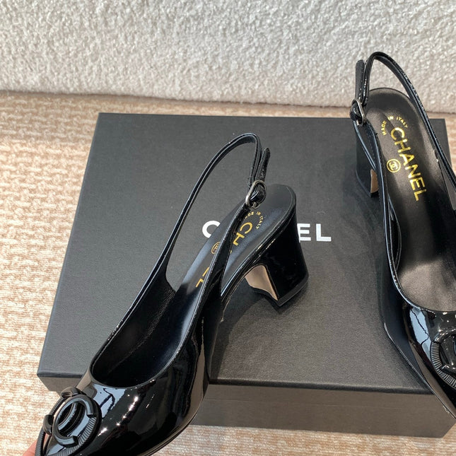 MID-HEEL SLINGBACKS IN BLACK PATENT CALFSKIN