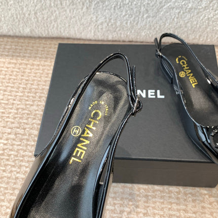 FLAT SLINGBACKS IN BLACK PATENT CALFSKIN