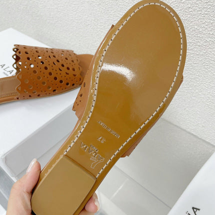 ALAIA VIENNE FLAT MULES IN CHOCOLATE BROWN LAMBSKIN