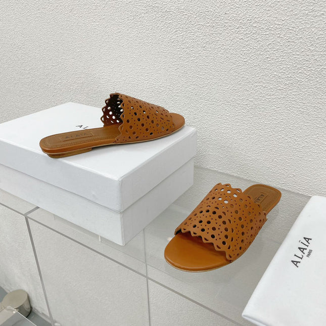 ALAIA VIENNE FLAT MULES IN CHOCOLATE BROWN LAMBSKIN