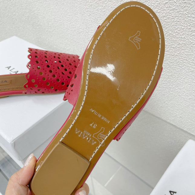 ALAIA VIENNE FLAT MULES IN CHERRY RED LAMBSKIN