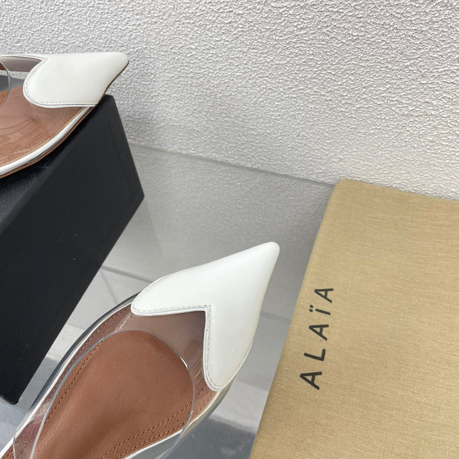 ALAIA LE COEUR FLAT SLINGBACKS IN WHITE PATENT LAMBSKIN