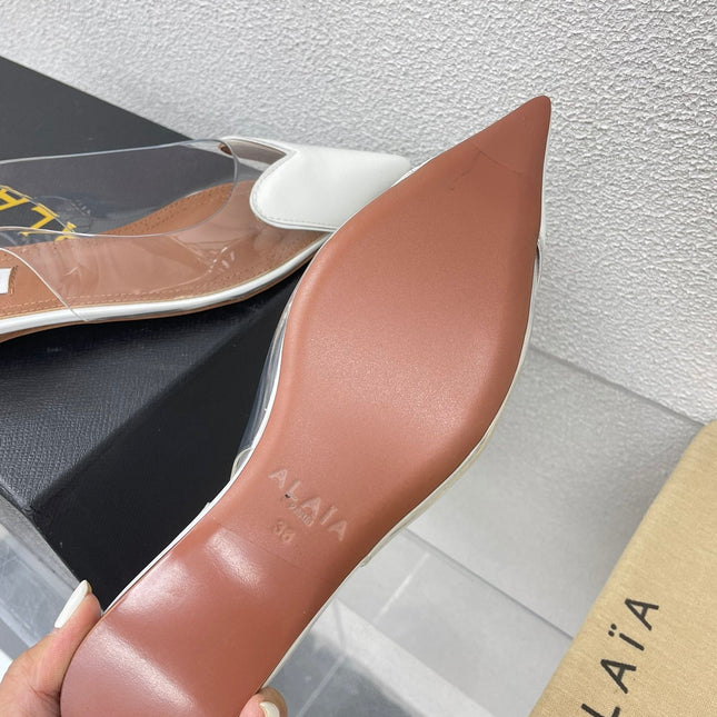 ALAIA LE COEUR FLAT SLINGBACKS IN WHITE PATENT LAMBSKIN
