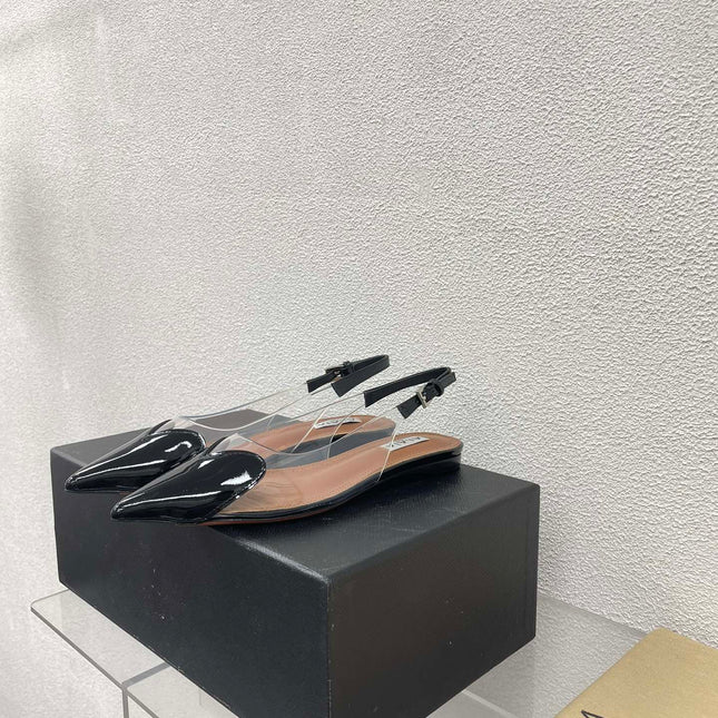 ALAIA LE COEUR FLAT SLINGBACKS IN BLACK PATENT LAMBSKIN