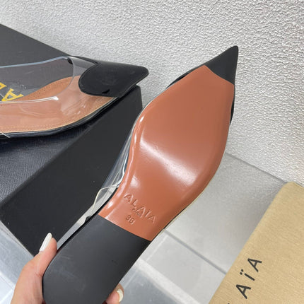 ALAIA LE COEUR FLAT SLINGBACKS IN BLACK PATENT LAMBSKIN