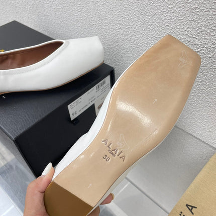 ALAIA BALLET FLATS IN WHITE CALFSKIN