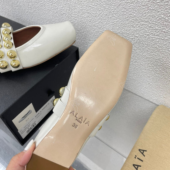 ALAIA MARY JANE PEARL IN GLOSSY WHITE LAMBSKIN
