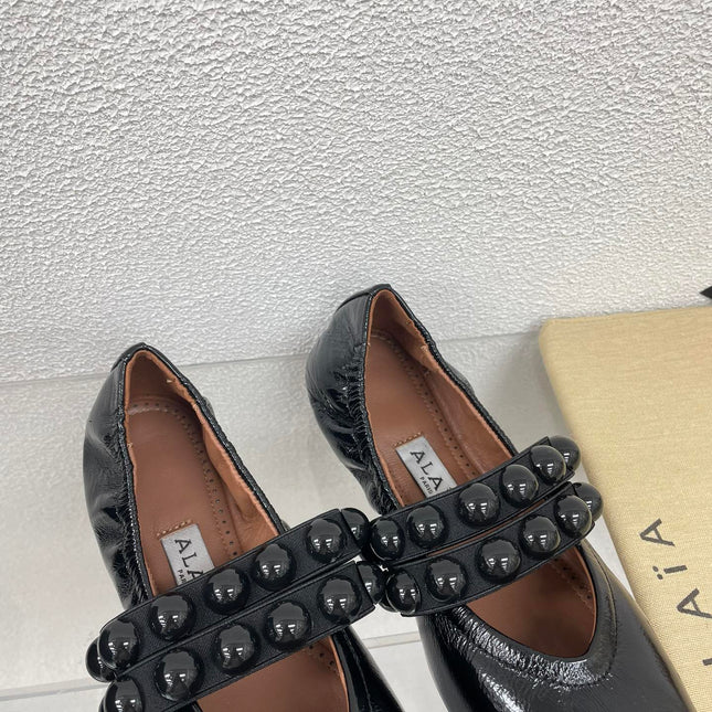 ALAIA MARY JANE PEARL IN GLOSSY BLACK LAMBSKIN