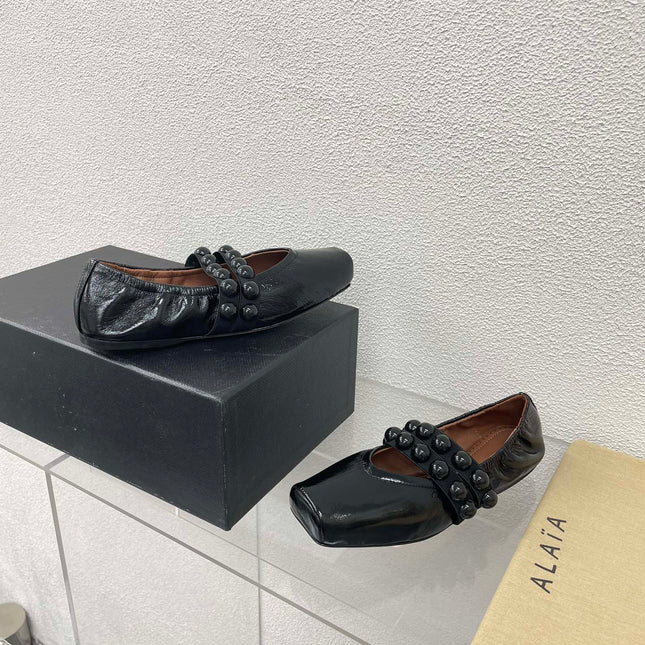 ALAIA MARY JANE PEARL IN GLOSSY BLACK LAMBSKIN