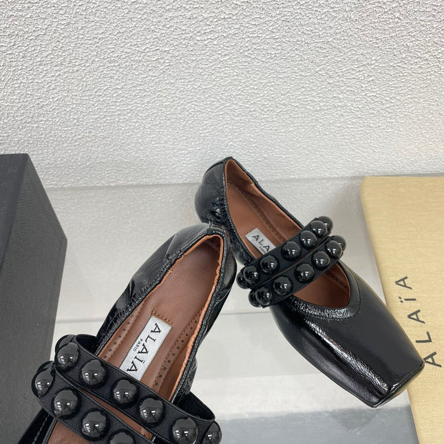 ALAIA MARY JANE PEARL IN GLOSSY BLACK LAMBSKIN
