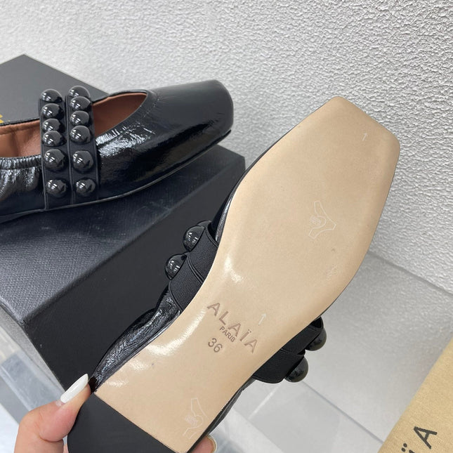 ALAIA MARY JANE PEARL IN GLOSSY BLACK LAMBSKIN