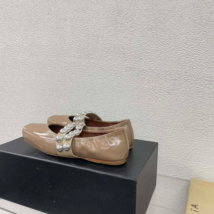 ALAIA MARY JANE PEARL IN GLOSSY BEIGE LAMBSKIN