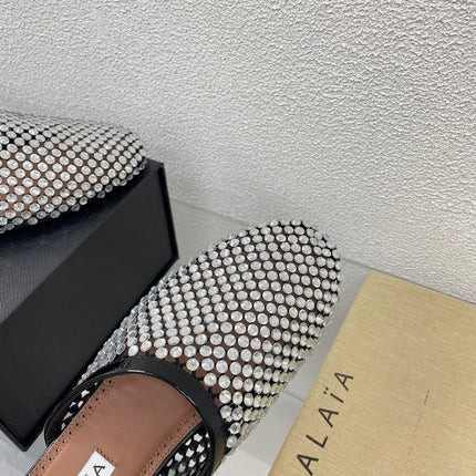 ALAIA FLAT MULES IN STRASS BLACK LAMBSKIN WITH RHINSTONES
