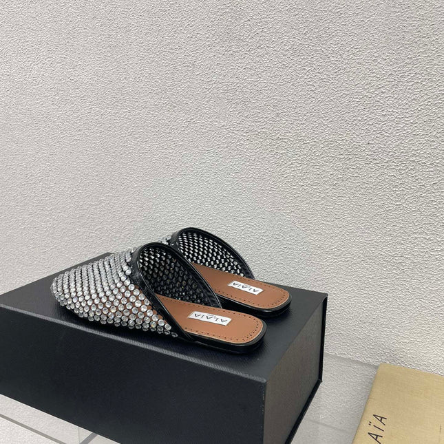 ALAIA FLAT MULES IN STRASS BLACK LAMBSKIN WITH RHINSTONES