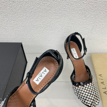 ALAIA HIGH FISHNET PUMPS IN BLACK MESH WITH WHITE RHINSTONES