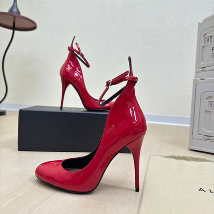 DECOLLETE PUMPS IN CHERRY RED PATENT CALFSKIN