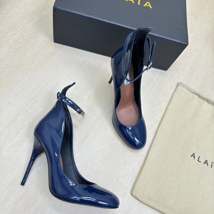 DECOLLETE PUMPS IN NAVY BLUE PATENT CALFSKIN