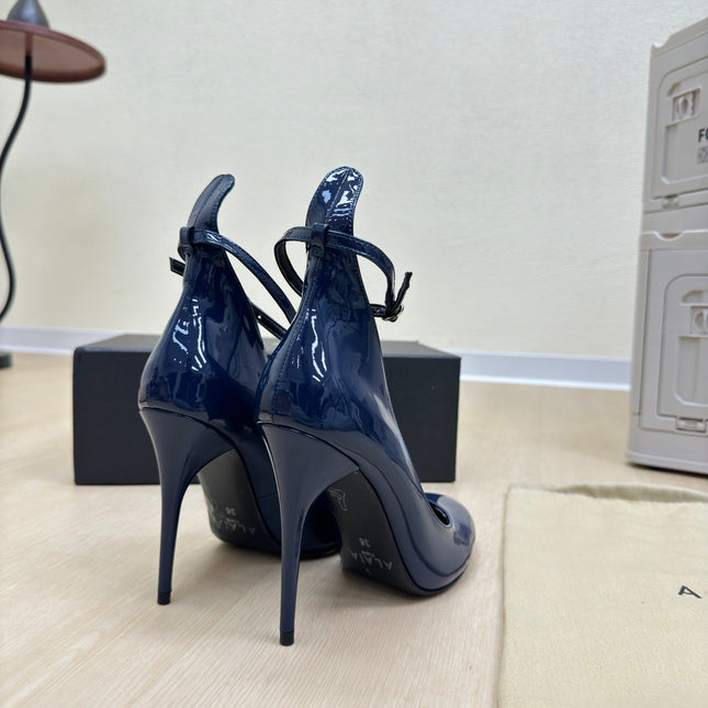 DECOLLETE PUMPS IN NAVY BLUE PATENT CALFSKIN