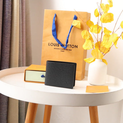 LV 25S SLENDER WALLET 11 IN BLACK TAIGA CALFSKIN