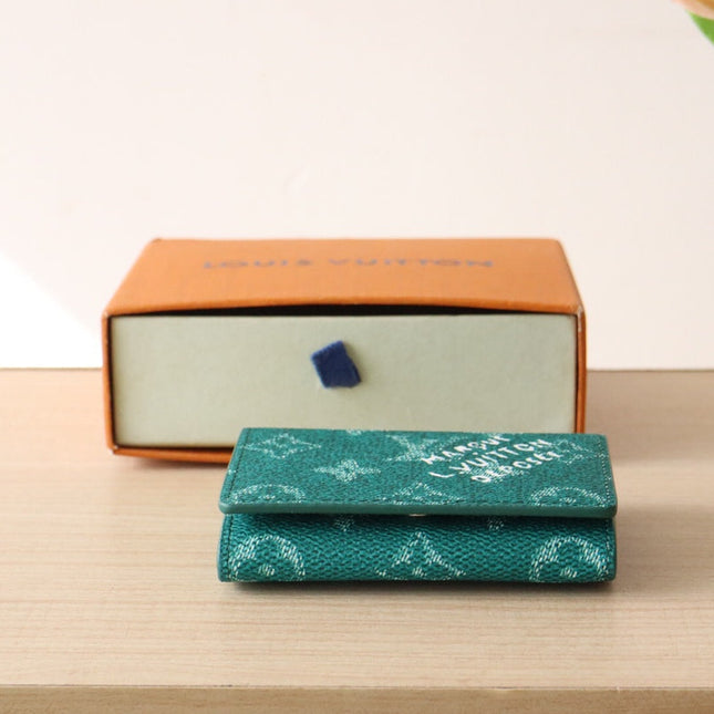 LV 25S ENVELOPE BUSINESS CARD HOLDER 10 IN DEEP TEAL MONOGRAM HERITAGE COATED CALFSKIN