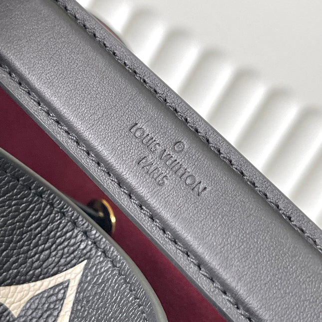CRAFTY NEONOE 26 IN BLACK AND CREAM BICOLOR EMPREINTE CALFSKIN