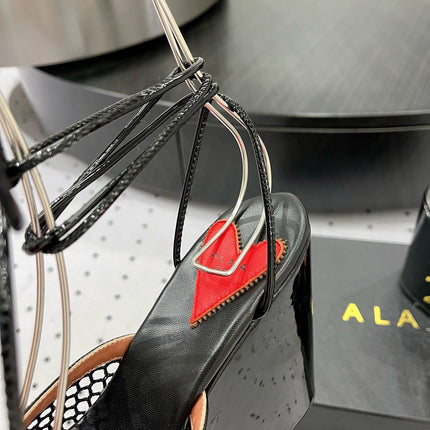 ALAIA BANQUET WEDGE SANDALS IN BLACK LAMBSKIN WITH RED HEART