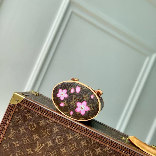 NANO BUCKET CHERRY BLOSSOM IN SAKURA BROWN MONOGRAM COATED CANVAS