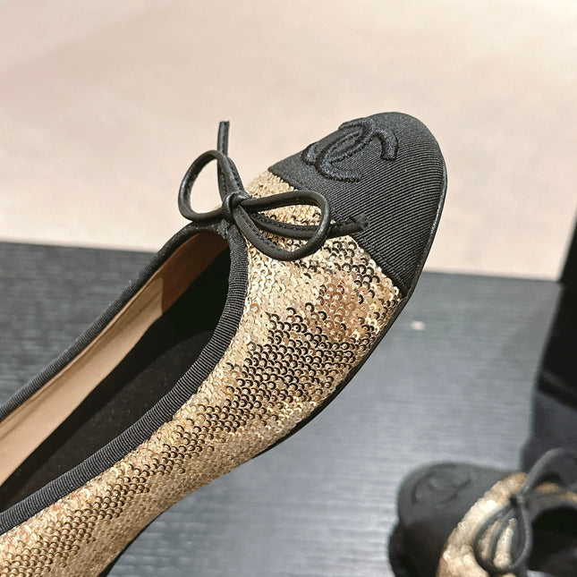BALLET FLATS IN GOLDEN GLITTERED TULLE AND BLACK SATIN