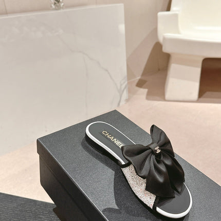 BOW LADY SLIPPERS BLACK LAMBSKIN WITH WHITE RHINESTONES