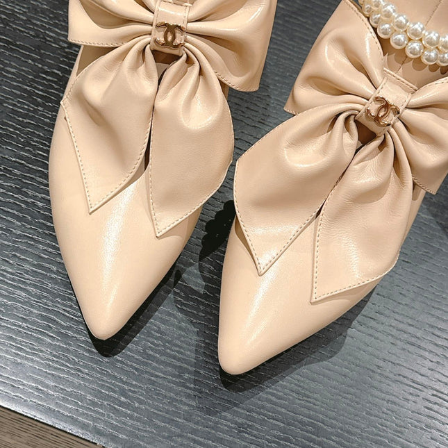 SHORT BOOTS IN BISQUE CREAM SHEEPSKIN WITH BOW