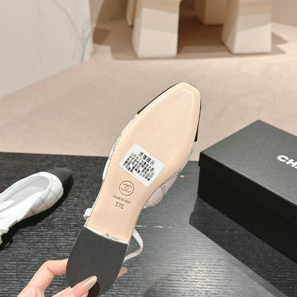 SLINGBACKS IN WHITE LAMBSKIN AND BLACK SATIN