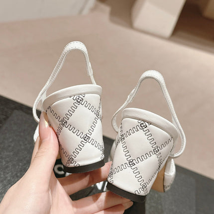 HIGH SLINGBACKS IN WHITE LAMBSKIN AND BLACK SATIN