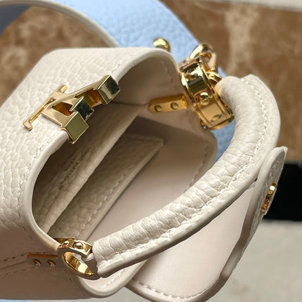 CAPUCINES MINI 21 IN CANDY BLUE TAURILLON GOLD HARDWARE