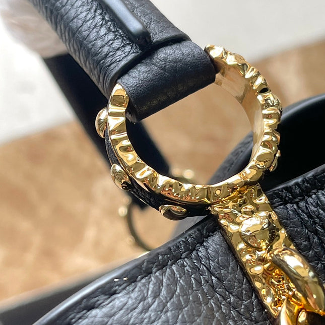 CAPUCINES EAST-WEST MINI 22 IN BLACK CALFSKIN GOLD HARDWARE