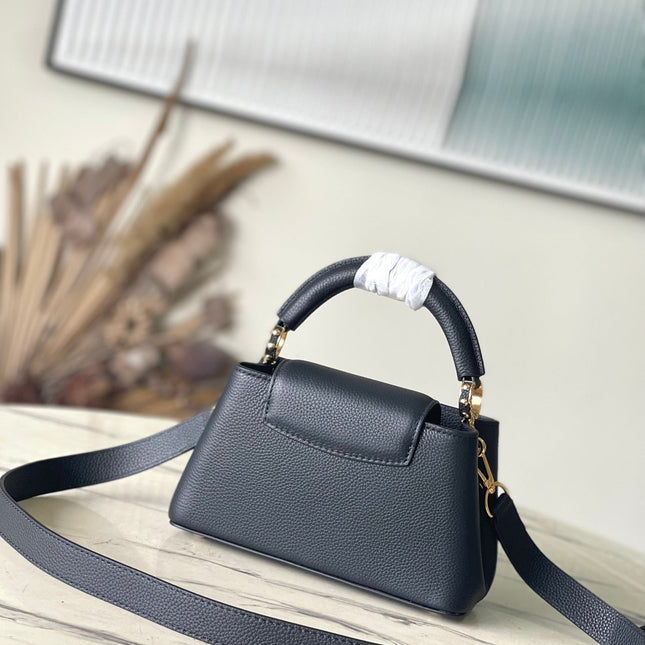 CAPUCINES EAST-WEST MINI 22 IN BLACK CALFSKIN GOLD HARDWARE