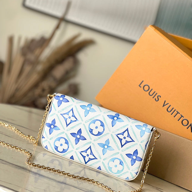 FÉLICIE POCHETTE 21 IN LAGOON BLUE MONOGRAM TILES CANVAS