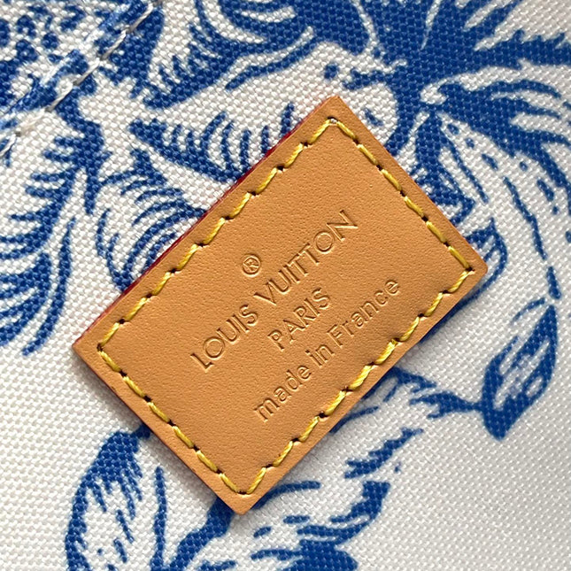 FÉLICIE POCHETTE 21 IN LAGOON BLUE MONOGRAM TILES CANVAS