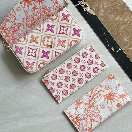 FÉLICIE POCHETTE 21 IN CORAL MONOGRAM TILES CANVAS