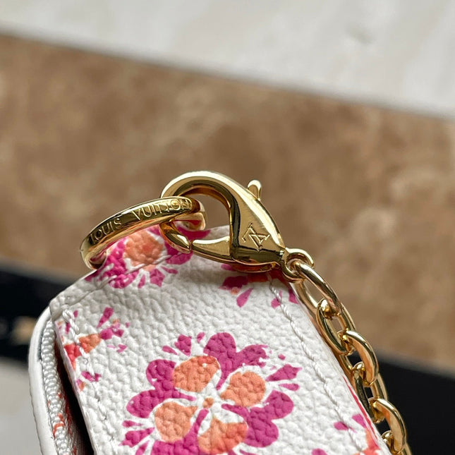 FÉLICIE POCHETTE 21 IN CORAL MONOGRAM TILES CANVAS