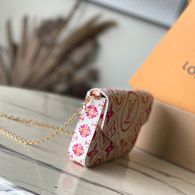FÉLICIE POCHETTE 21 IN CORAL MONOGRAM TILES CANVAS