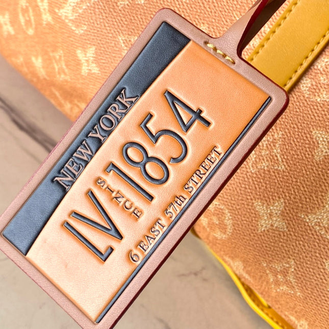 KEEPALL BANDOULIÈRE 55 IN ORANGE MONOGRAM HERITAGE CANVAS