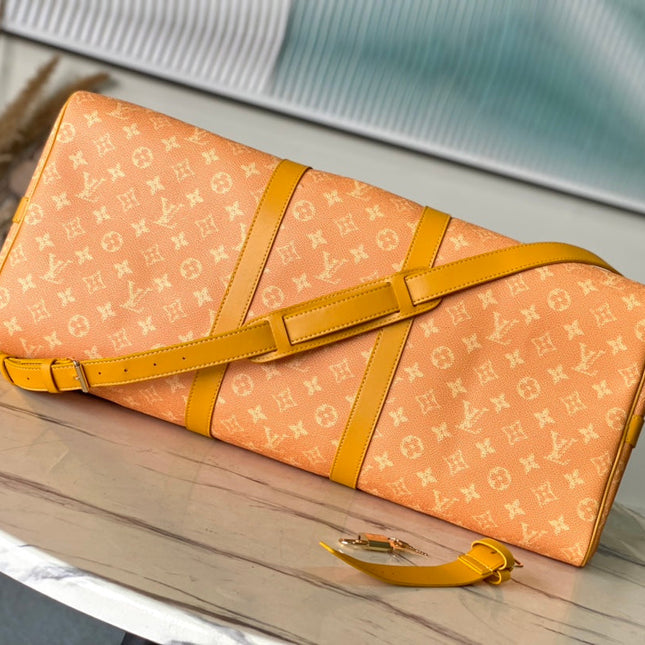KEEPALL BANDOULIÈRE 55 IN ORANGE MONOGRAM HERITAGE CANVAS