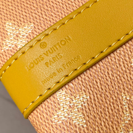 KEEPALL BANDOULIÈRE 55 IN ORANGE MONOGRAM HERITAGE CANVAS