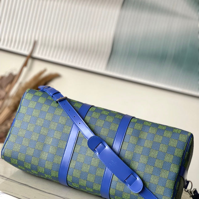 KEEPALL BANDOULIÈRE 45 IN BLUE GREEN DAMIER HERITAGE COATED CANVAS
