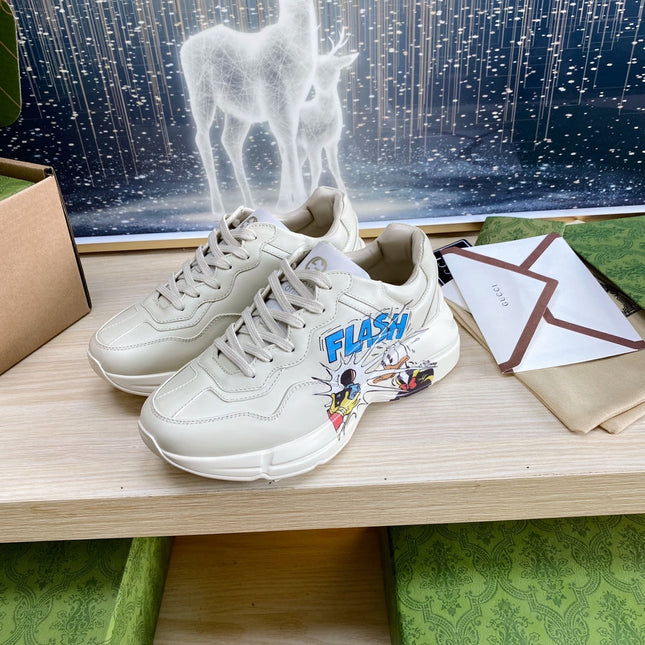 GG COUPLE TRAINER WHITE CALFSKIN WITH DONALD DUCK ICON