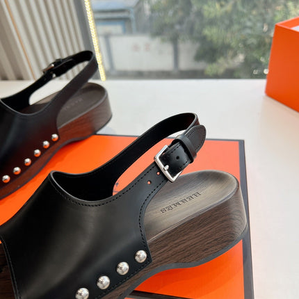 FLAT SANDAL IN BLACK CALFSKIN