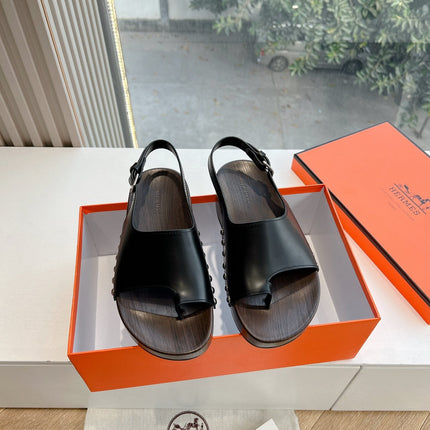 FLAT SANDAL IN BLACK CALFSKIN